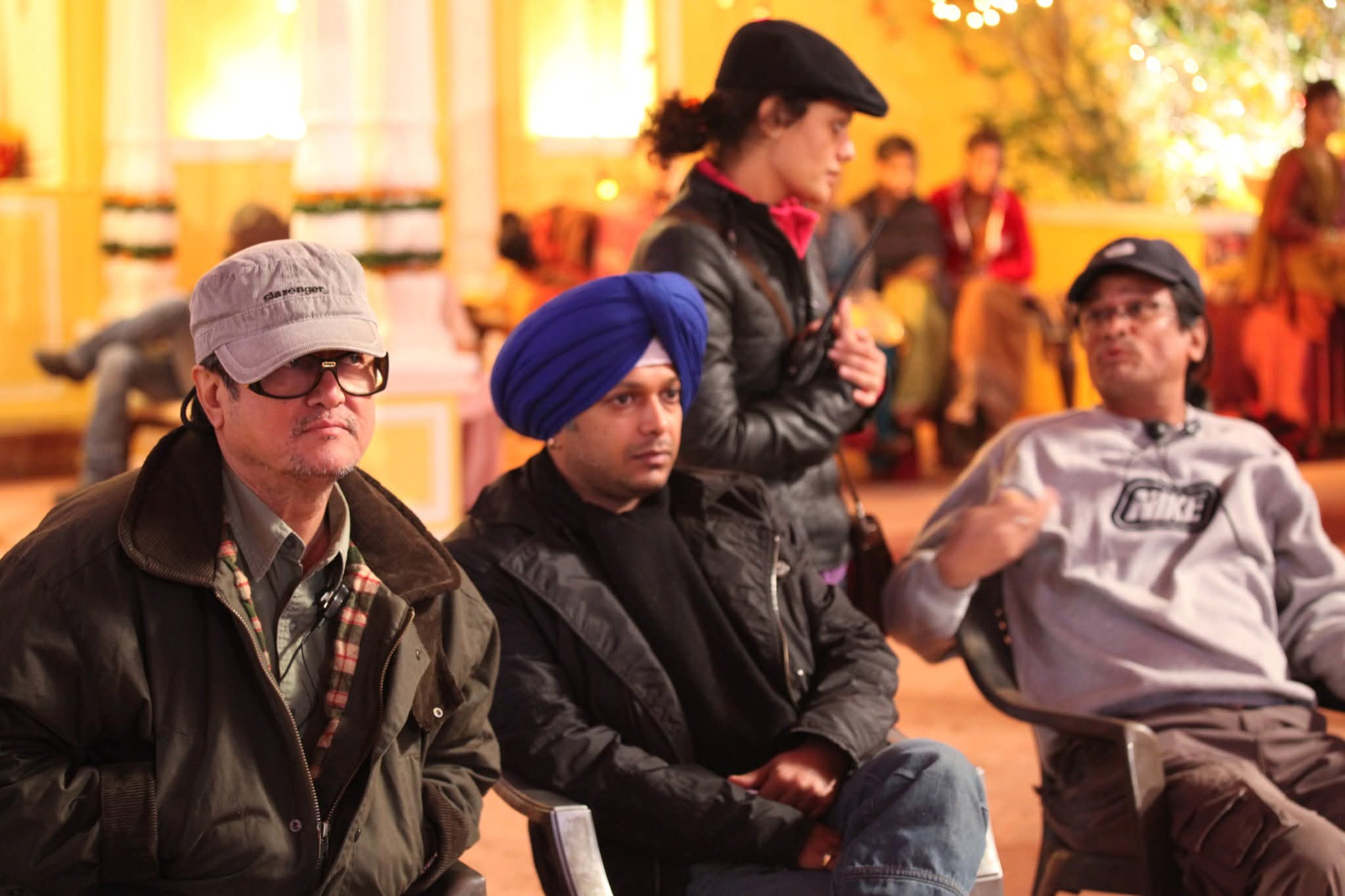 Tanvi Gandhi working on a film set with the production team