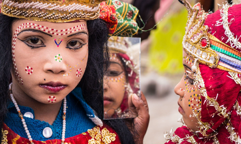 who dress up as the Hindu gods and beg for money.